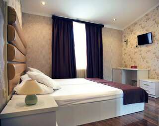 Отель Rondo Hotel Тбилиси Стандартный двухместный номер с 2 отдельными кроватями-1